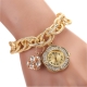 Gouden horloge met een gouden armband